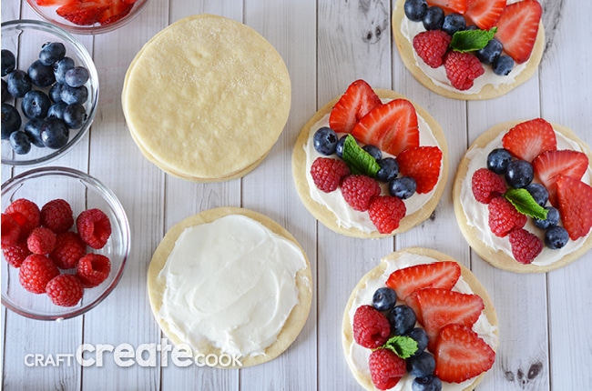 These fruit pizzas are quick and easy to make and will look gorgeous and taste amazing at your Memorial Day, Fourth of July or summer barbecue outing this summer!