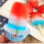 The 4th of July is just around the corner, so I've been preparing a list of the recipes and crafts my family and I plan on making. On the top of the list are these Red, White, and Blue Popsicles.