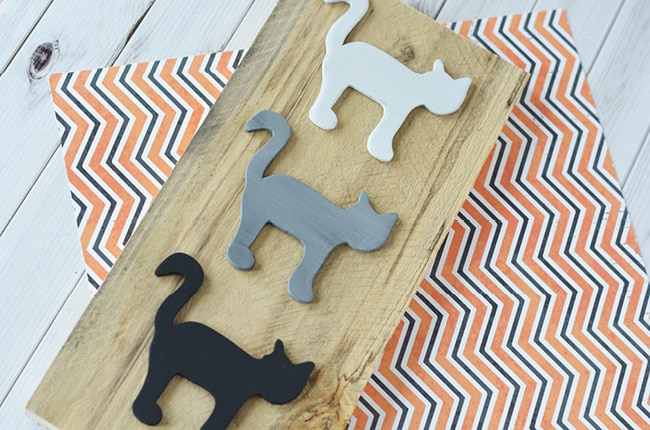 Made from an old pallet and simple wood cutouts, this DIY Halloween Decor will be perfect with your seasonal decorations.