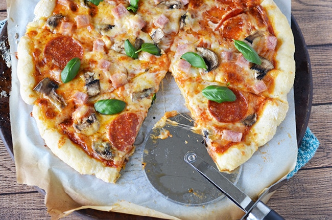 Sounds too good to be true, but this 2 ingredient homemade pizza dough is amazing. You'll want to make it for dinner tomorrow!