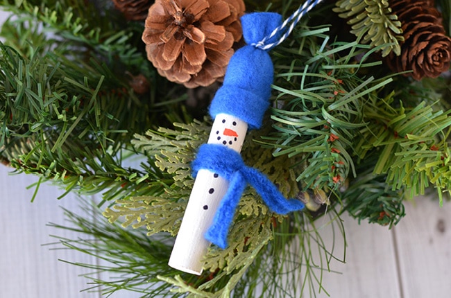 You'll want to set aside an afternoon to make lots of these easy snowman ornaments to attach to all of your gifts and give to your family and friends this holiday season.