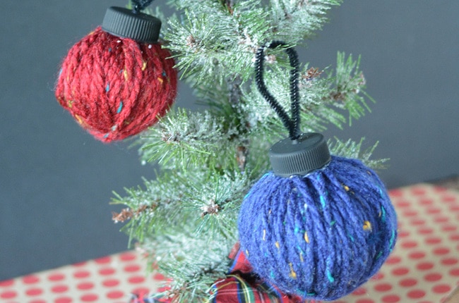 Reuse plastic shopping bags and bottle caps to make these easy and affordable homemade yarn ball ornaments.