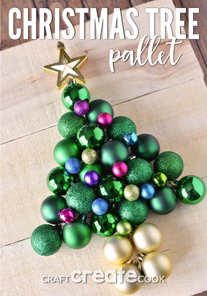 Grab some inexpensive plastic ornaments and a few pallet boards and you can make this pallet Christmas tree that is guaranteed to never drop needles!