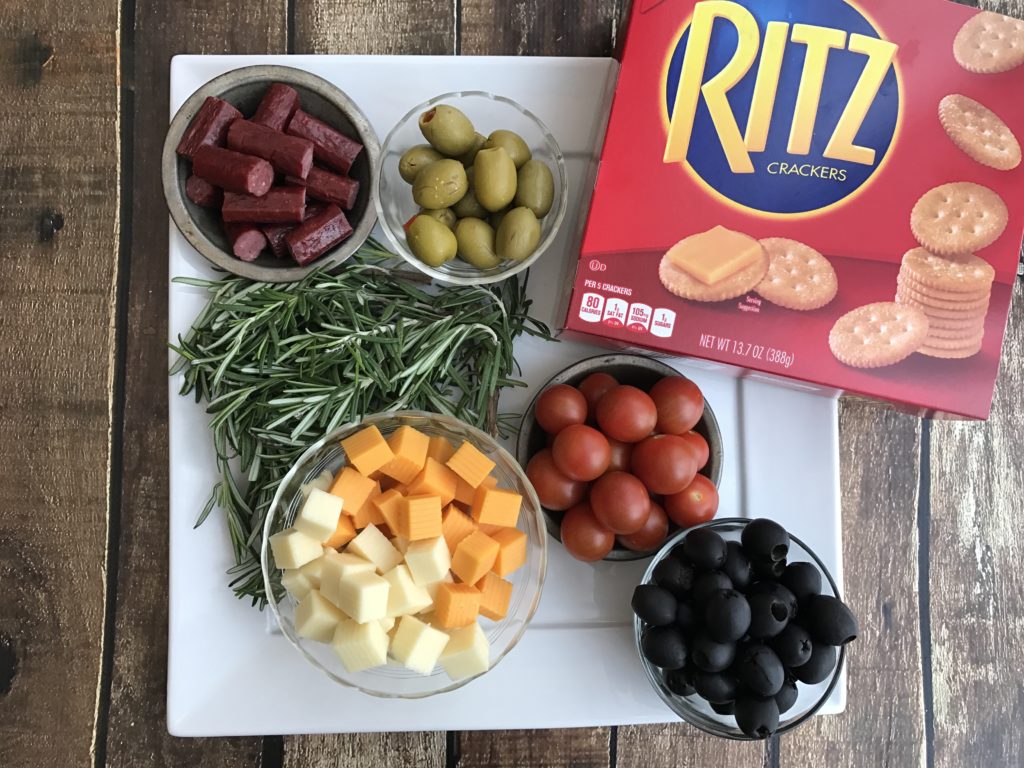 If you are entertaining or bringing a dish to pass this holiday season, this RITZ Crackers Christmas tree is the perfect holiday appetizer to share!