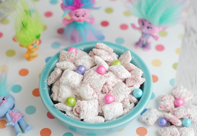 Sing, dance and hug while you make and eat this Trolls puppy chow!