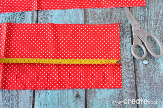 Cue up your favorite Netflix show and make this easy Valentine Fabric Wreath! 