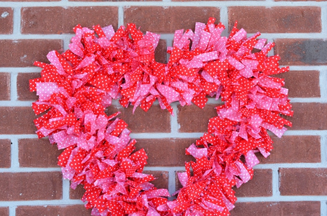 Cue up your favorite Netflix show and make this easy Valentine Fabric Wreath!