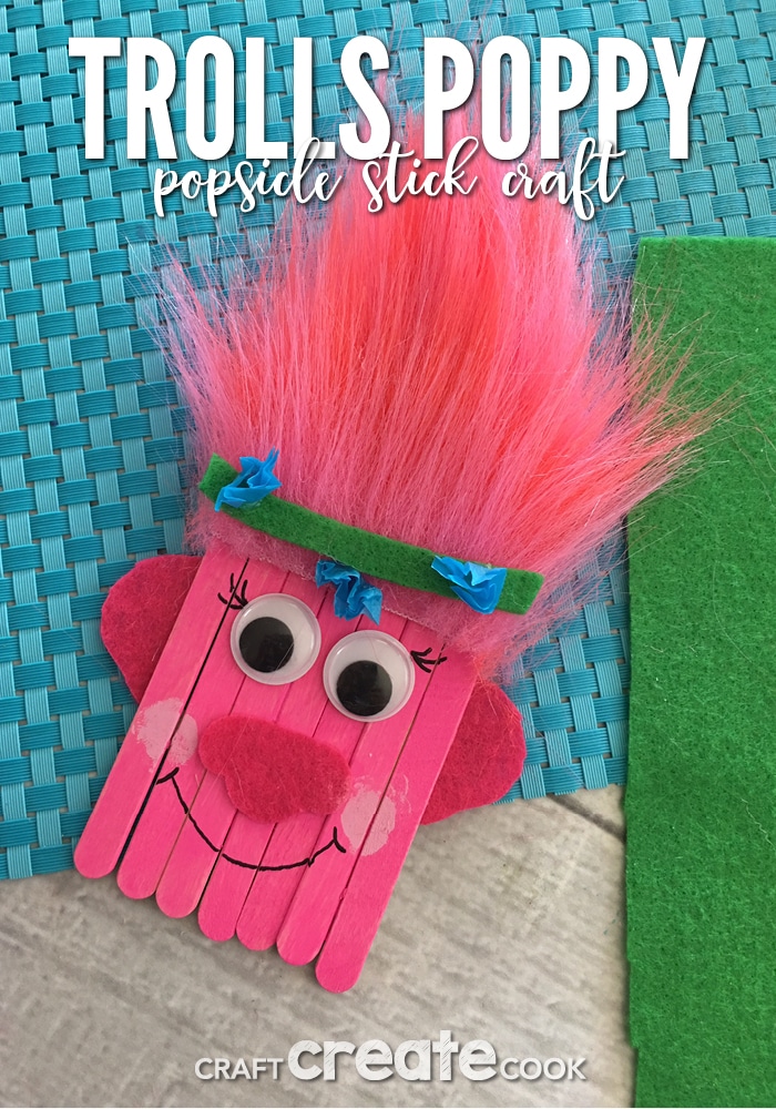 This Trolls Poppy Popsicle Stick Craft for Kids will have you thinking it's all cupcakes and rainbows in no time.