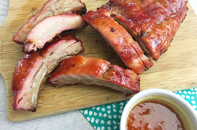 These Extra Tender Peach Ginger Charcoal Grilled Ribs will make your mouth water just by looking them.