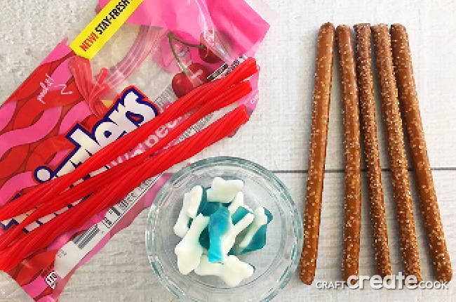 These Shark Week Fishing Pole Treats are a perfect snack for the kids to make and eat during Shark Week!