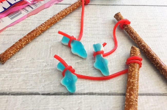 These Shark Week Fishing Pole Treats are a perfect snack for the kids to make and eat during Shark Week!