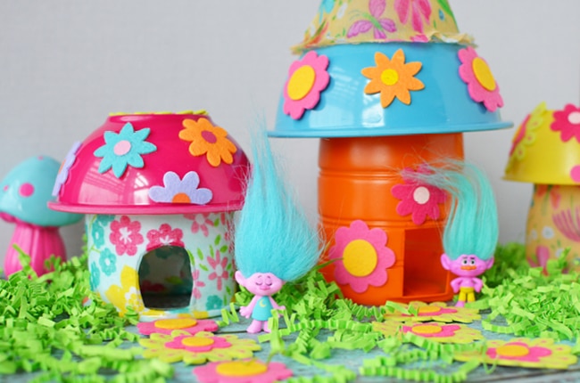 Make your own troll house using plastic recyclables and a few dollar store finds!