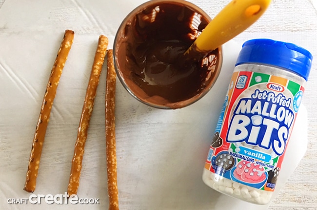 These Hot Chocolate Pretzel Rods taste just like a cup of hot chocolate with marshmallows.