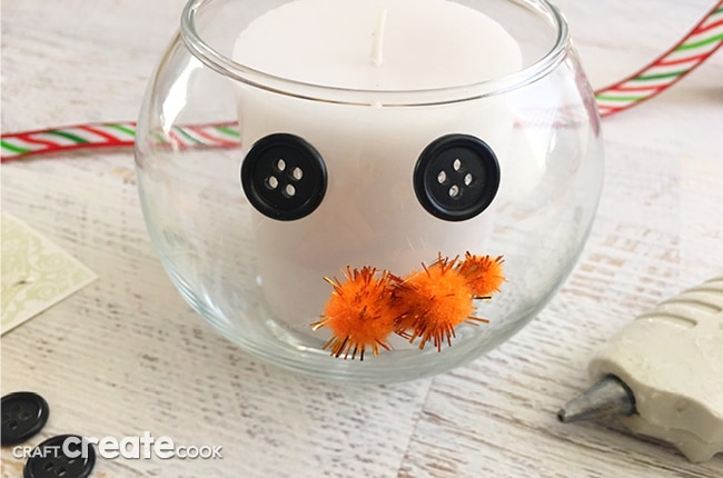 This DIY Winter Snowman Candle Craft will not only look festive, it will have your house smelly great in no time.