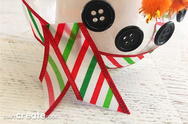 This DIY Winter Snowman Candle Craft will not only look festive, it will have your house smelly great in no time.