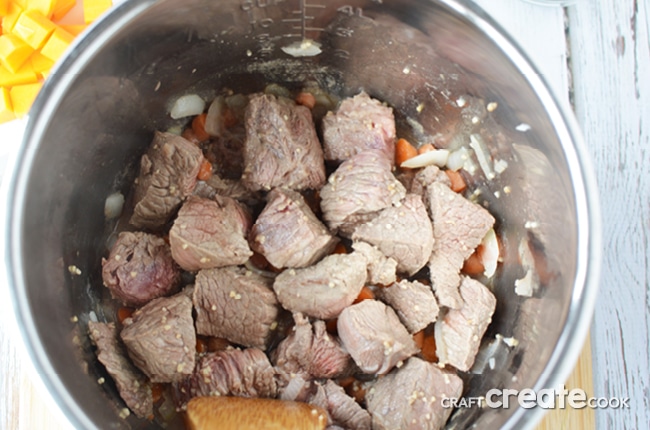 Our wholesome Instant Pot Beef and Squash Stew recipe is BURSTING with flavor and ready in a snap!