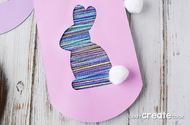 This easy to make Easter bunny bunting can be made with any color yarn to create holiday decor to match your home.