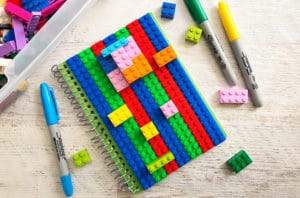 This DIY Lego Journal Craft will make traveling more fun by being able to play with Legos on the go.