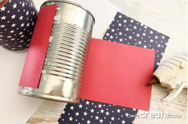 Our Easy Tin Can Ball Toss Game is the perfect backyard game and it only takes a few minutes to make.