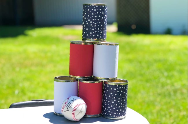 Our Easy Tin Can Ball Toss Game is the perfect backyard game and it only takes a few minutes to make.