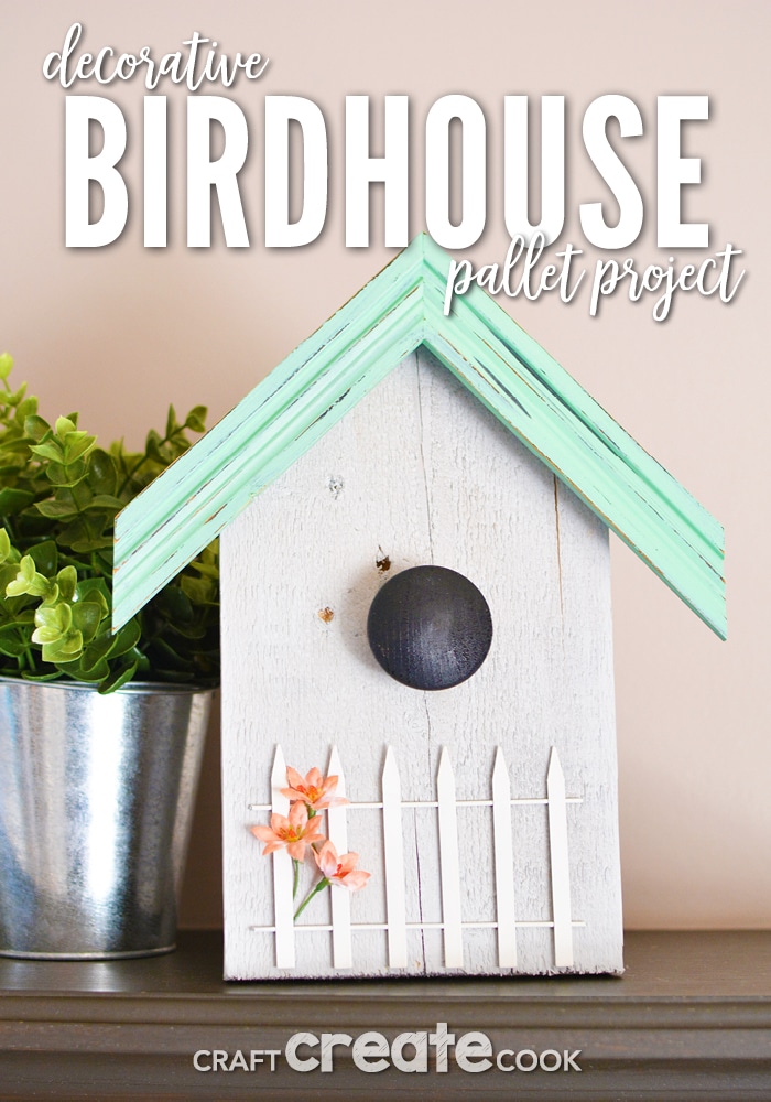 Our decorative birdhouse pallet project is a great way to reuse scrap wood and picture frames as well as add some fun to your home!