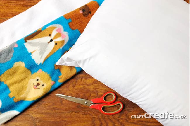 If your dog loves to be comfortable than you'll want to learn How to make your own No-Sew Dog Bed.