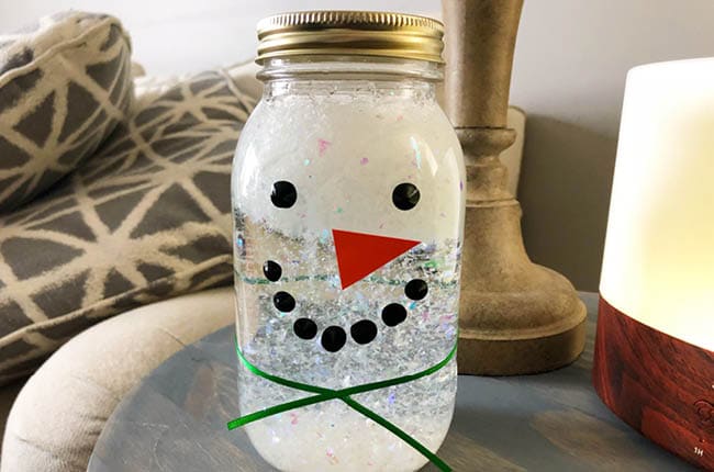 Need a craft to make with your kids during winter? Our Snowman Sensory Jar is the perfect one!