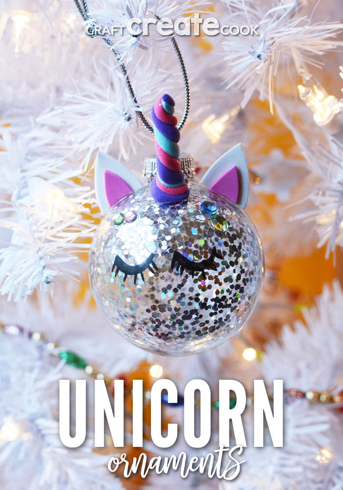 Up close picture of a unicorn ornament on a white holiday tree