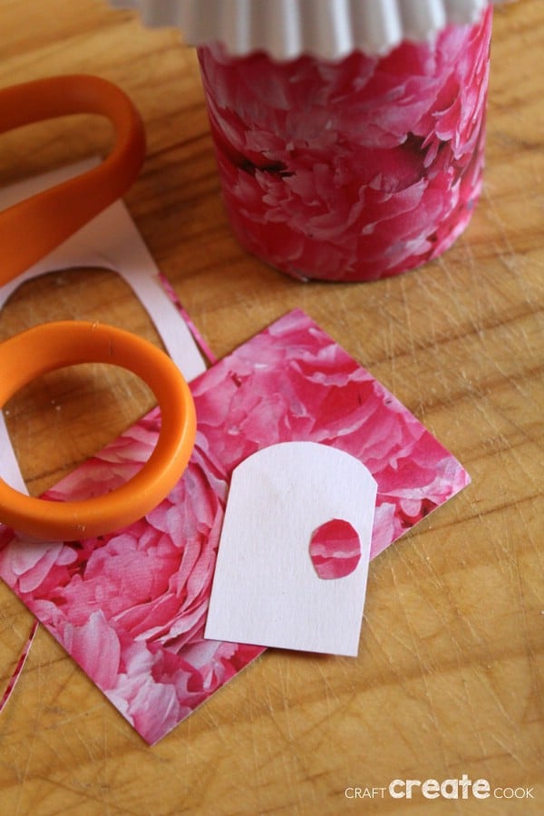 Cutting door out of paper for fairy house