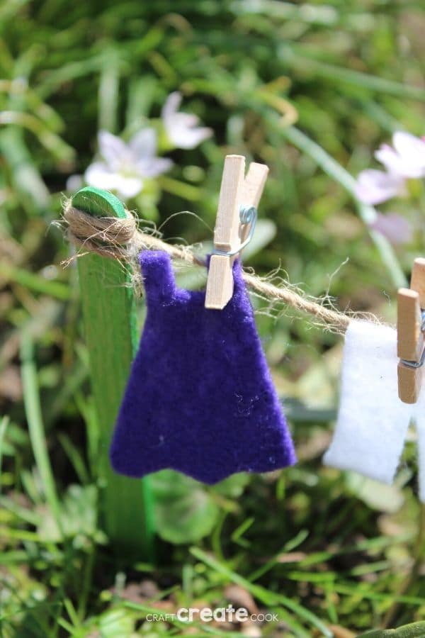 Fairy garden clotheline with purple clothing