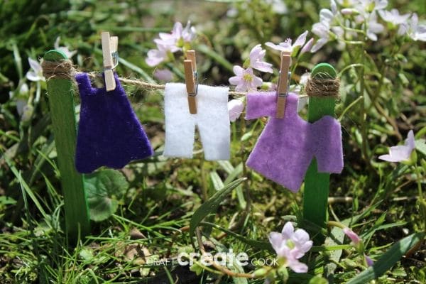 Fairy garden clotheline with purple clothing