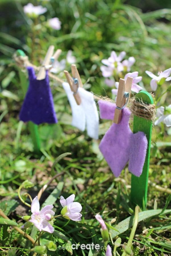 Fairy garden clotheline with purple clothing