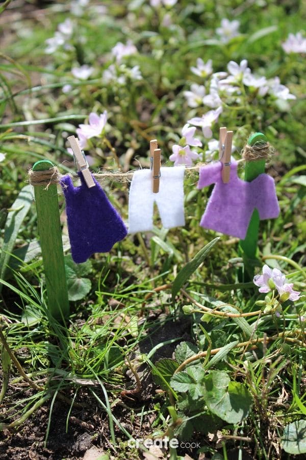 Fairy garden clotheline with purple clothing