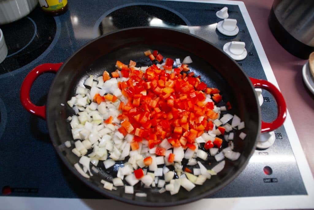 Skillet of onions and bell peppers