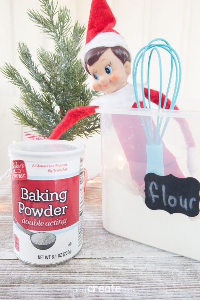 Elf in bucket of flour