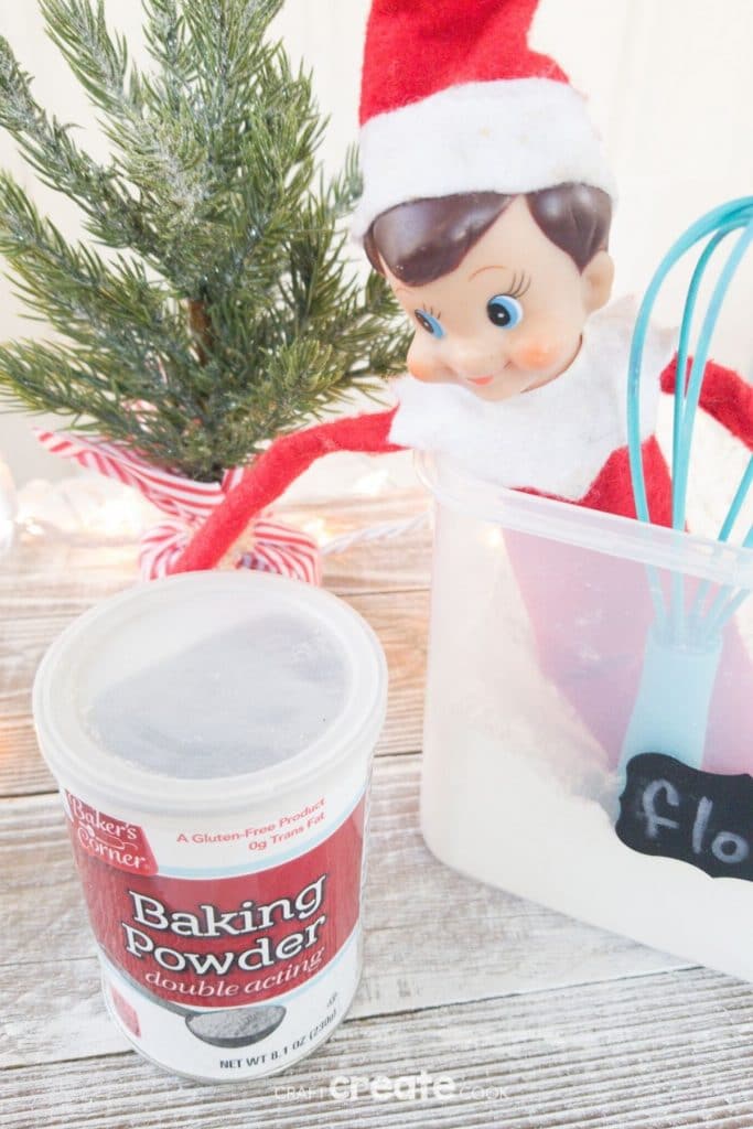 Elf in bucket of flour