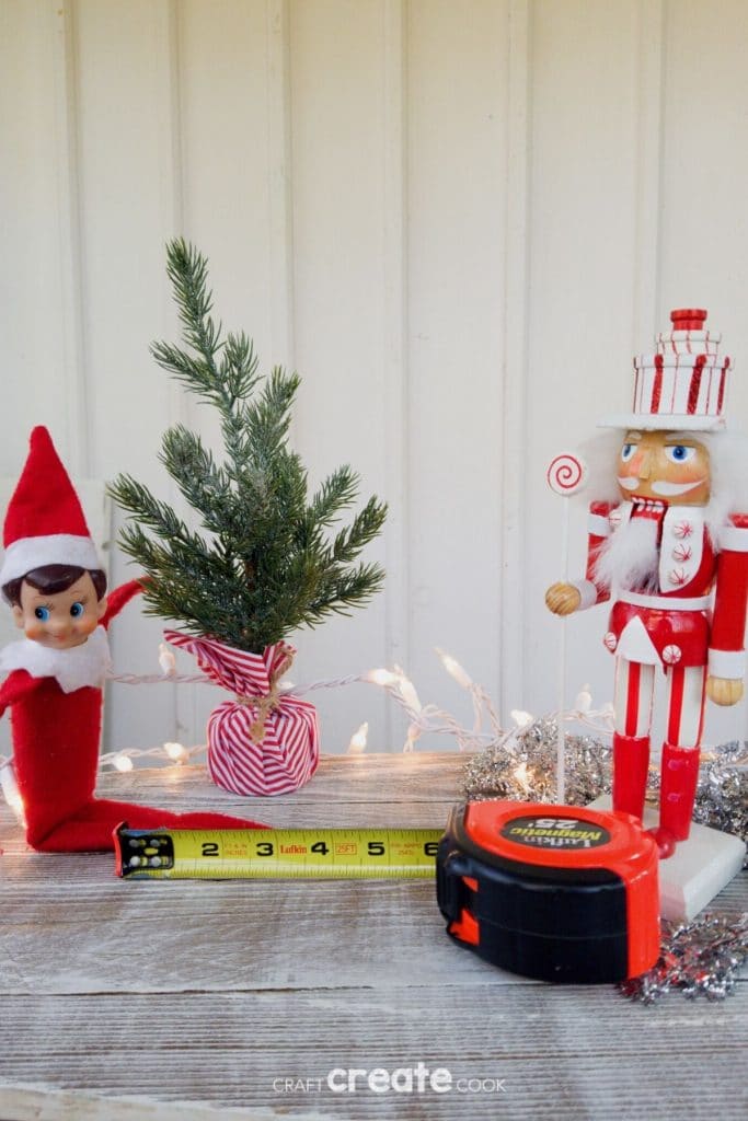 Elf on the shelf with tape measure