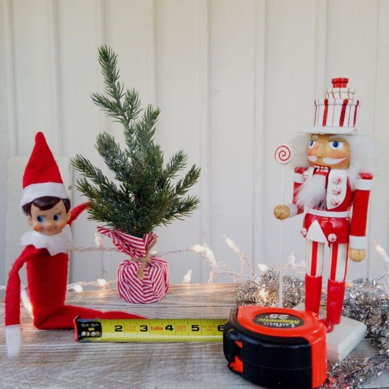 Elf on the shelf with tape measure