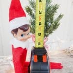 Elf on the shelf with tape measure