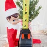 Elf on the shelf with tape measure