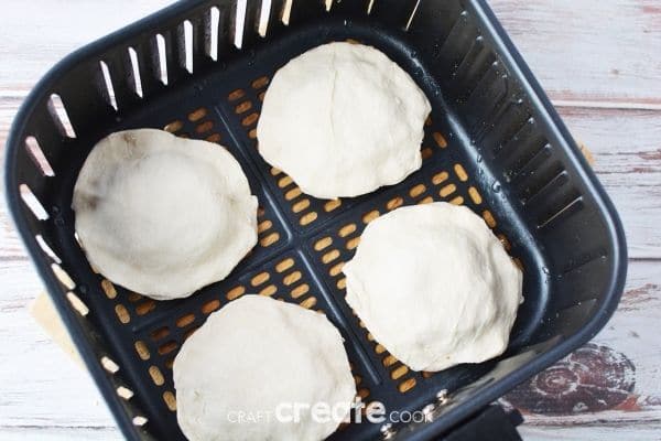 Biscuit sandwiches in air fryer basket